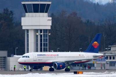 D-AHIL in front of Bern Tower